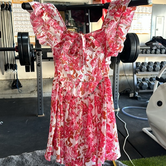 NWT dress with tie back closure and open back. Size L - Picture 3 of 5